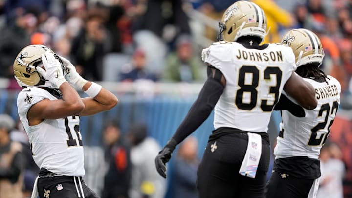 New Orleans Saints WR Chris Olave (12) celebrates a touchdown reception with WR Rashid Shaheed (22) and TE Juwan Johnson (83) on Oct. 19, 2025.