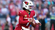 Nov 10, 2024; Glendale, Arizona, USA; Arizona Cardinals quarterback Kyler Murray (1) rolls out against the New York Jets during the first half at State Farm Stadium. Mandatory Credit: Joe Camporeale-Imagn Images