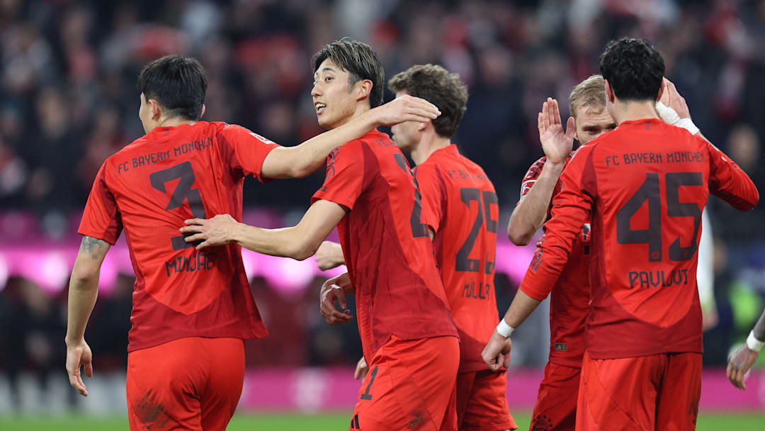 Bayern Munich players celebrating Hiroki Ito's goal against Eintracht Frankfurt.