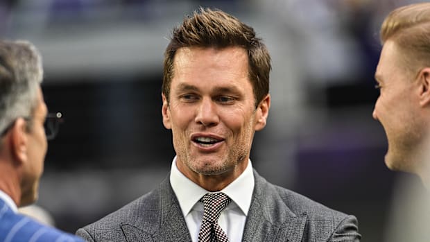 Dec 29, 2024; Minneapolis, Minnesota, USA;  FOX broadcaster and former NFL quarterback Tom Brady.