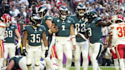 Feb 12, 2023; Glendale, AZ, USA; Philadelphia Eagles quarterback Jalen Hurts (1) celebrates with teammates after scoring a rushing touchdown against the Kansas City Chiefs during the first quarter in Super Bowl LVII at State Farm Stadium. Mandatory Credit: Michael Chow/The Republic via Imagn Images