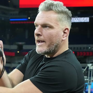 Pat McAfee watches workouts at the 2025 NFL Scouting Combine.