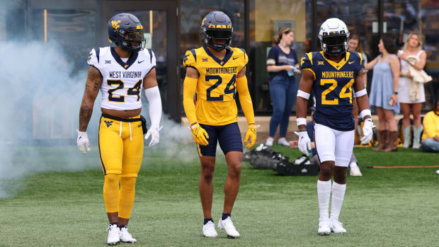 West Virginia University football unveils the new uniform combinations during the Gold-Blue Spring Game.