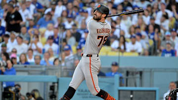 Sep 20, 2025; Los Angeles, California, USA;  San Francisco Giants first baseman Bryce Eldridge (78) doubles in three runs in the first inning against the Los Angeles Dodgers at Dodger Stadium. Mandatory Credit: Jayne Kamin-Oncea-Imagn Images