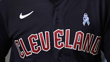 Jun 18, 2023; Phoenix, Arizona, USA; The details of a Cleveland Guardians jersey featuring a Fathers Day patch prior to the game against the Arizona Diamondbacks at Chase Field. Mandatory Credit: Joe Camporeale-Imagn Images