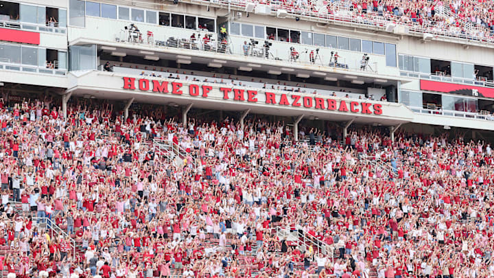 Aug 30, 2025; Fayetteville, Arkansas, USA; Arkansas Razorbacks fans cheer after a score against the Alabama A&M Bulldogs during the third quarter at Donald W. Reynolds Razorback Stadium. Mandatory Credit: Nelson Chenault-Imagn Images