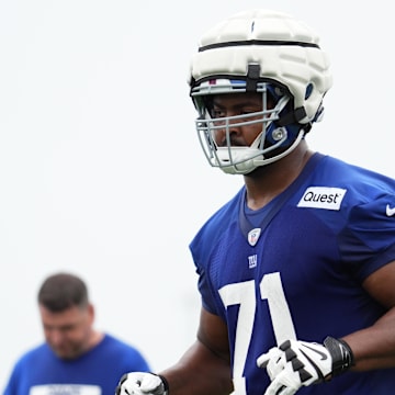 Jul 25, 2024; East Rutherford, NY, USA; New York Giants offensive tackle Marcellus Johnson (71) jogs to the sideline during training camp at Quest Diagnostics Training Center. Mandatory Credit: Lucas Boland-Imagn Images