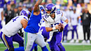 Nov 30, 2025; Seattle, Washington, USA; Minnesota Vikings quarterback Max Brosmer (12) runs the ball during the first half against the Seattle Seahawks at Lumen Field.