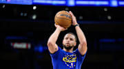 Oct 21, 2025; Los Angeles, California, USA; Golden State Warriors guard Stephen Curry (30) warms up prior to a game against the Los Angeles Lakers at Crypto.com Arena. Mandatory Credit: William Liang-Imagn Images
