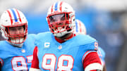 Jan 5, 2025; Nashville, Tennessee, USA;  Tennessee Titans defensive tackle Jeffery Simmons (98) warms up before a game against the Houston Texans at Nissan Stadium. Mandatory Credit: Steve Roberts-Imagn Images