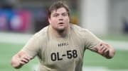 Mar 3, 2024; Indianapolis, IN, USA; Oregon offensive lineman Jackson Powers-Johnson (OL58) during the 2024 NFL Combine at Lucas Oil Stadium. Mandatory Credit: Kirby Lee-USA TODAY Sports