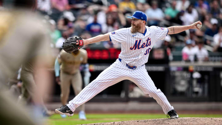 Jun 16, 2024; New York City, New York, USA; New York Mets pitcher Jake Diekman (30) pitches against the San Diego Padres during the eighth inning at Citi Field. Mandatory Credit: John Jones-USA TODAY Sports