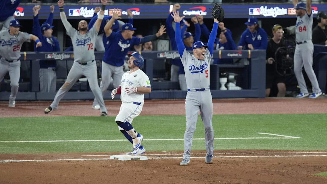 Nov 1, 2025; Toronto, Ontario, CAN; Los Angeles Dodgers first baseman Freddie Freeman (5) celebrates after defeating the Toronto Blue Jays in game seven of the 2025 MLB World Series at Rogers Centre. Mandatory Credit: Kevin Sousa-Imagn Images