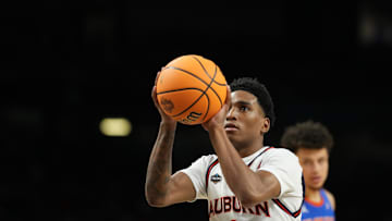 Apr 5, 2025; San Antonio, TX, USA; Auburn Tigers guard Tahaad Pettiford (0) shoots a free throw against the Florida Gators during the first half in the semifinals of the men's Final Four of the 2025 NCAA Tournament at the Alamodome. Mandatory Credit: Bob Donnan-Imagn Images