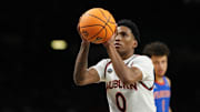 Apr 5, 2025; San Antonio, TX, USA; Auburn Tigers guard Tahaad Pettiford (0) shoots a free throw against the Florida Gators during the first half in the semifinals of the men's Final Four of the 2025 NCAA Tournament at the Alamodome. Mandatory Credit: Bob Donnan-Imagn Images