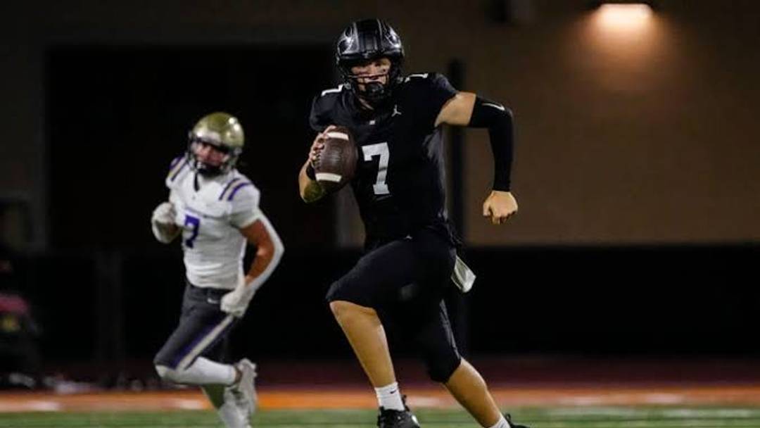 Desert Edge quarterback Blake Roskopf (7) scrambles against Notre Dame Prep during a game at Desert Edge High School in Goodyear on Sept. 10, 2026. Desert Edge quarterback Blake Roskopf (7) scrambles against Notre Dame Prep during a game at Desert Edge High School in Goodyear on Sept. 10, 2026.