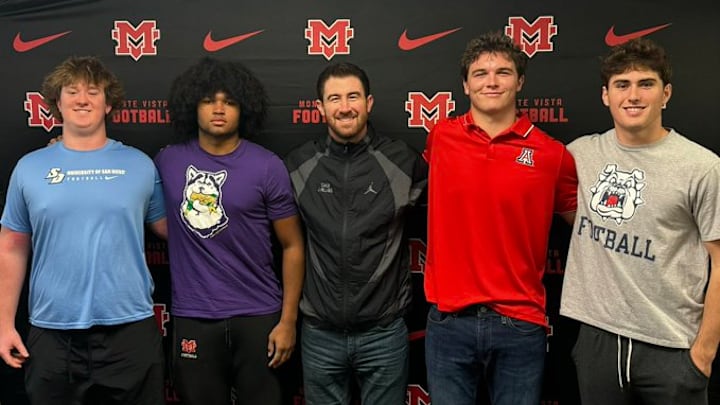 Four Monte Vista of Danville football players signed their early letters of intent, from L-R: OL Zach Struempf (San Diego), RB Julian McMahan (Washington), coach Johnny Millard, TE Kellan Ford (Arizona) and QB Brayden Turner (Fresno State).