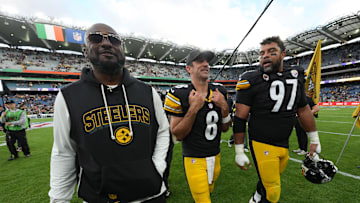 Pittsburgh Steelers coach Mike Tomlin, quarterback Aaron Rodgers, and defensive tackle Cameron Heyward