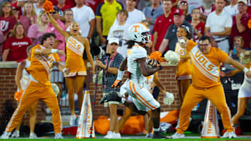Sep 21, 2024; Norman, Oklahoma, USA;  Tennessee Volunteers wide receiver Dont'e Thornton Jr. (1) runs for a touchdown during the first quarter against the Oklahoma Sooners at Gaylord Family-Oklahoma Memorial Stadium. Mandatory Credit: Kevin Jairaj-Imagn Images