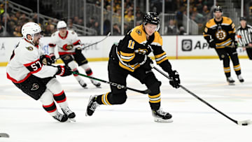 Jan 23, 2025; Boston, Massachusetts, USA; Boston Bruins center Trent Frederic (11) skates against the Ottawa Senators during the third period at the TD Garden. Mandatory Credit: Brian Fluharty-Imagn Images