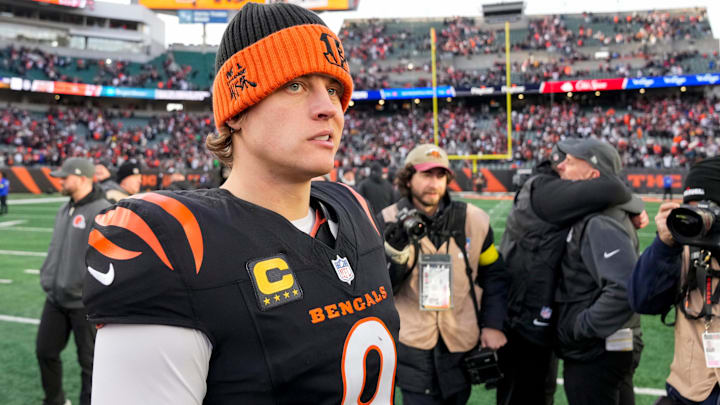 Cincinnati Bengals quarterback Joe Burrow (9) looks for hands to shake after the fourth quarter of the NFL Week 18 game between the Cincinnati Bengals and the Cleveland Browns at Paycor Stadium in Downtown Cincinnati on Sunday, Jan. 4, 2026. The Browns kicked a last second field goal to win 20-18.