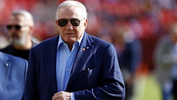 Dallas Cowboys owner Jerry Jones walks off the field before the game between the Washington Commanders and the Dallas Cowboys at Northwest Stadium.