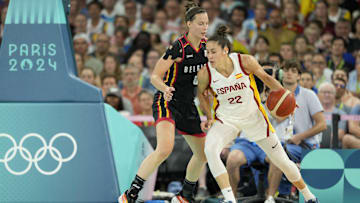 Aug 7, 2024; Paris, France; Spain small forward Maria Conde (22) dribbles against Belgium small forward Antonia Delaere (6) in the first quarter during the Paris 2024 Olympic Summer Games at Accor Arena. Mandatory Credit: Kyle Terada-Imagn Images