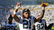 Green Bay Packers cornerback Eric Stokes (21) celebrates as he leaves the field following the game against the Houston Texans.