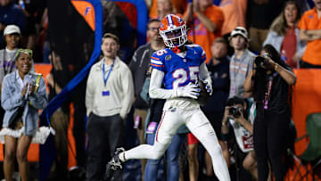 Oct 19, 2024; Gainesville, Florida, USA; Florida Gators defensive back Cormani McClain (25) runs with the ball for a touchdown against the Kentucky Wildcats during the second half at Ben Hill Griffin Stadium. Mandatory Credit: Matt Pendleton-Imagn Images