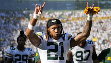 Oct 20, 2024; Green Bay, Wisconsin, USA;  Green Bay Packers cornerback Eric Stokes (21) celebrates as he leaves the field following the game against the Houston Texans at Lambeau Field. Mandatory Credit: Jeff Hanisch-Imagn Images