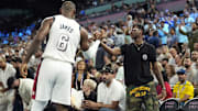 LeBron James (6) shakes hands with son Bryce James during the Paris 2024 Olympic Summer Games.