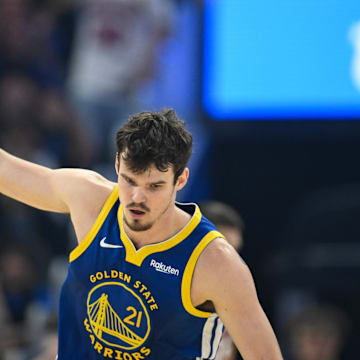 Nov 4, 2025; San Francisco, California, USA; Golden State Warriors center Quinten Post (21) celebrates a three point basket against the Phoenix Suns in the first quarter at Chase Center. Mandatory Credit: Eakin Howard-Imagn Images