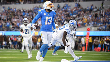 Los Angeles Chargers WR Keenan Allen celebrates after scoring a touchdown  against the Detroit Lions.