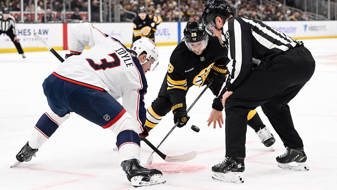 Feb 26, 2026; Boston, Massachusetts, USA; Boston Bruins center Elias Lindholm (28) fces off against Columbus Blue Jackets center Charlie Coyle (3) during the first period at TD Garden. Mandatory Credit: Eric Canha-Imagn Images