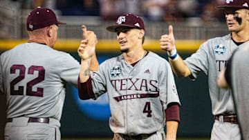 Jun 17, 2024; Omaha, NE, USA; Texas A&M Aggies center fielder Travis Chestnut (4) congratulates teammates after defeating the Kentucky Wildcats at Charles Schwab Field Omaha. Mandatory Credit: Dylan Widger-USA TODAY Sports