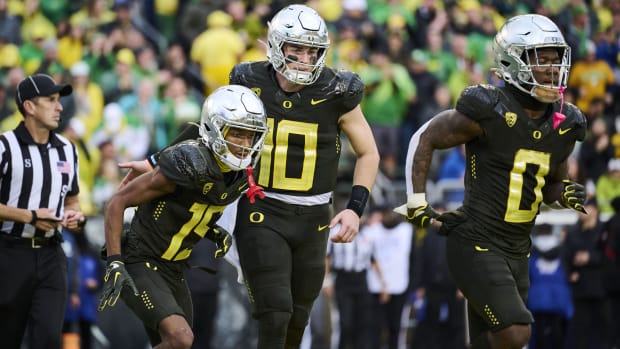 Nov 4, 2023; Eugene, Oregon, USA; Oregon Ducks wide receiver Tez Johnson (15) celebrates his touchdown reception