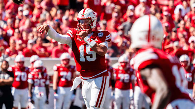 Nebraska Cornhuskers quarterback Dylan Raiola (15) throws to wide receiver Isaiah Neyor (18) 