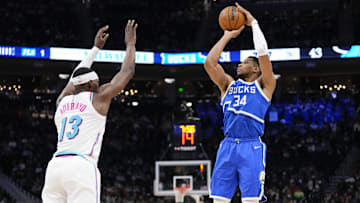 Feb 23, 2025; Milwaukee, Wisconsin, USA;  Milwaukee Bucks forward Giannis Antetokounmpo (34) shoots against Milwaukee Bucks guard Ryan Rollins (13) during the second quarter at Fiserv Forum. Mandatory Credit: Jeff Hanisch-Imagn Images