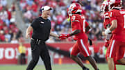 Houston Cougars head coach Willie Fritz celebrates with wide receiver Amare Thomas (0) after Thomas scores a touchdown.