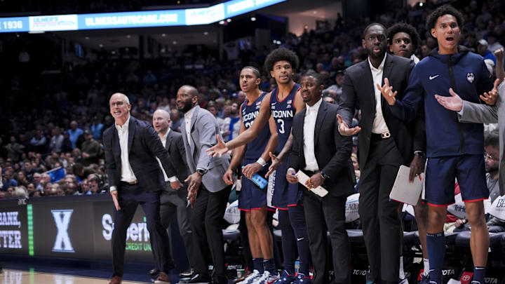 Jan 25, 2025; Cincinnati, Ohio, USA; Connecticut Huskies head coach Dan Hurley, left, and his bench react against the Xavier Musketeers in the second half at the Cintas Center. Mandatory Credit: Aaron Doster-Imagn Images Jan 25, 2025; Cincinnati, Ohio, USA; Connecticut Huskies head coach Dan Hurley, left, and his bench react against the Xavier Musketeers in the second half at the Cintas Center. Mandatory Credit: Aaron Doster-Imagn Images
