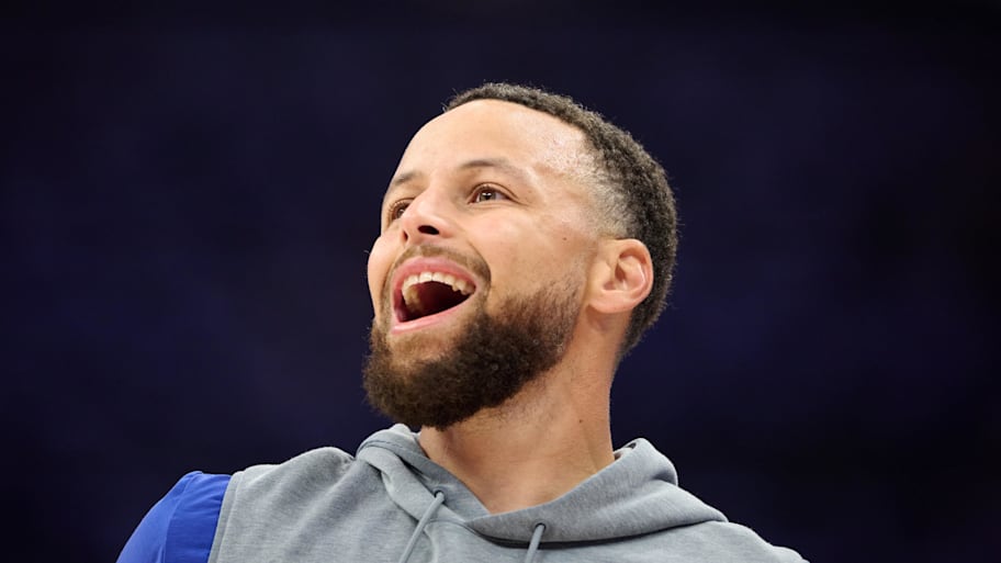 Golden State Warriors guard Stephen Curry reacts during warmups ahead of a game against the Sacramento Kings.