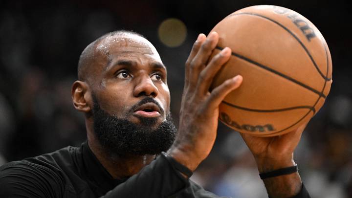 Boston, Massachusetts, USA; Los Angeles Lakers forward LeBron James (23) takes a shot during warmups before a game against the Boston Celtics  at the TD Garden. 