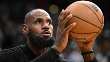 Los Angeles Lakers forward LeBron James (23) takes a shot during warmups before a game against the Boston Celtics at the TD Garden.