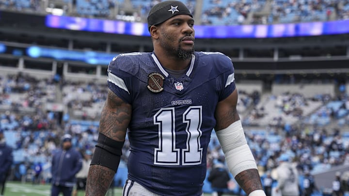 Dec 15, 2024; Charlotte, North Carolina, USA; Dallas Cowboys linebacker Micah Parsons (11) walks onto the field during the first quarter against the Carolina Panthers at Bank of America Stadium. Mandatory Credit: Jim Dedmon-Imagn Images