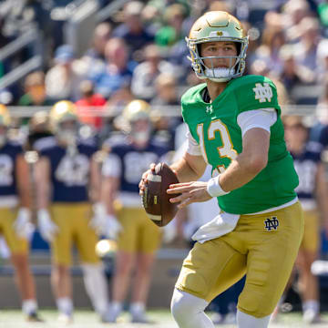 CJ Carr and the Notre Dame Fighting Irish are slight road favorites against the Miami Hurricanes in Week 1.