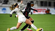 Dec 6, 2024; Cary, NC, USA; Stanford defender Nya Harrison (23) with the ball as Wake Forest midfielder Emily Colton (3) defends in the second half at WakeMed Soccer Park. Mandatory Credit: Bob Donnan-Imagn Images