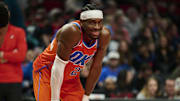 Nov 30, 2025; Portland, Oregon, USA; Oklahoma City Thunder guard Shai Gilgeous-Alexander (2) smiles at a fan during the second half in a game against the Portland Trail Blazers at Moda Center. Mandatory Credit: Troy Wayrynen-Imagn Images