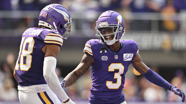 Sep 10, 2023; Minneapolis, Minnesota, USA; Minnesota Vikings wide receiver Jordan Addison (3) reacts with wide receiver Justin Jefferson (18) after scoring his first career touchdown pass from quarterback Kirk Cousins (not pictured) against the Tampa Bay Buccaneers during the second quarter at U.S. Bank Stadium. Mandatory Credit: Jeffrey Becker-USA TODAY Sports