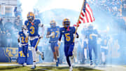 Nov 29, 2025; Pittsburgh, Pennsylvania, USA;  Pittsburgh Panthers linebacker Rasheem Biles (3) and wide receiver Raphael Williams Jr. (5) lead the team onto the field to play the Miami Hurricanes at Acrisure Stadium. Mandatory Credit: Charles LeClaire-Imagn Images