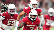 Nov 23, 2025; Glendale, Arizona, USA; Arizona Cardinals safety Budda Baker (3) celebrates after making a catch during the fourth quarter against the Jacksonville Jaguars at State Farm Stadium. Mandatory Credit: Joe Camporeale-Imagn Images